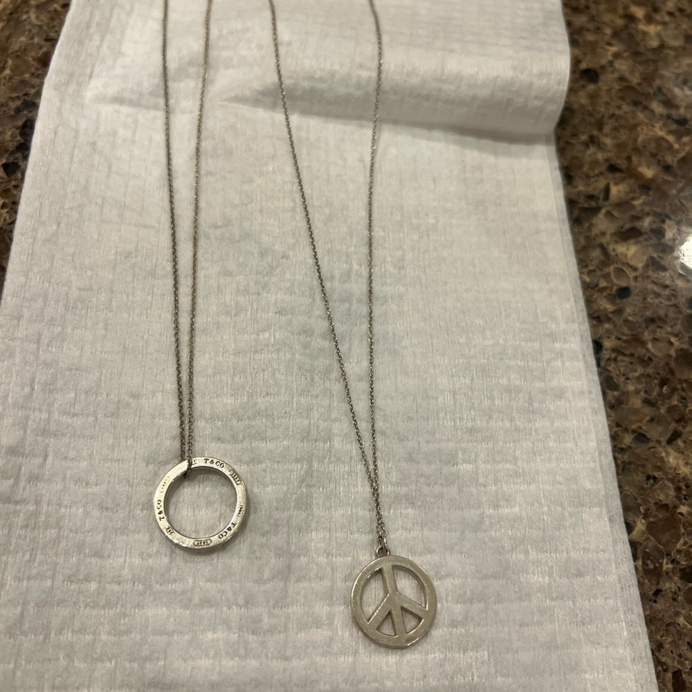 Tiffany and Co. Silver Peace Pendant Necklace